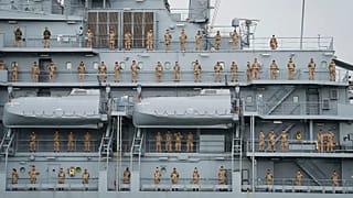 FILE: German Navy personnel stand in position on combat supply ship FGS Frankfurt am Main as it arrives at port Klang in Kuala Lumpur, 15 October 2024
