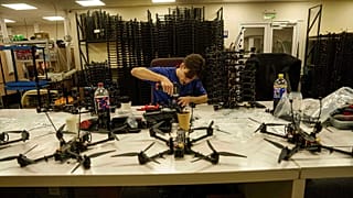 engineer assembles FPV drone of "General Cherry" company at the workshop in Ukraine, on Dec. 4, 2025