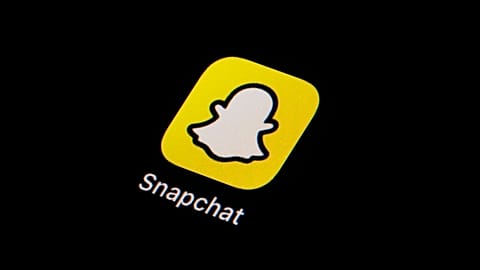 The icon for instant messaging app Snapchat is seen on a smartphone, Tuesday, Feb. 28, 2023, in Marple Township, Pa. 