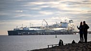 The tanker Maria Energy, left, loaded with liquefied natural gas, is moored at the floating terminal Hoegh Esperanza, in Wilhelmshaven, Germany, Jan. 3, 2023.