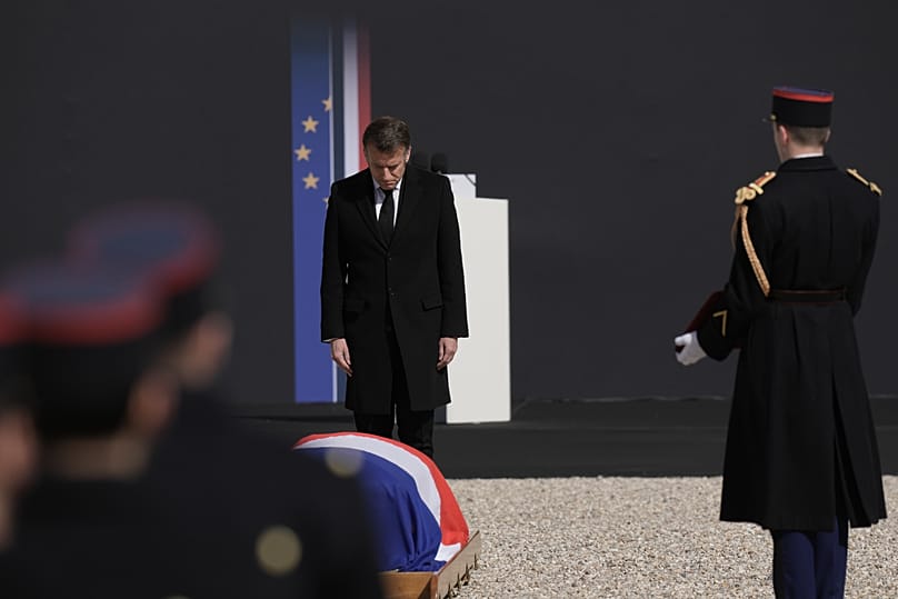 French President Emmanuel Macron bows in front of the coffin of late French Prime Minister Lionel Jospin during a national homage ceremony in Paris, 26 March, 2026