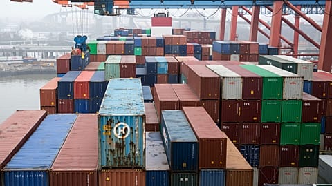 Containers are unloaded by a freighter at the Eurokai terminal (Eurogate) in the port of Hamburg, Germany, March 22, 2019