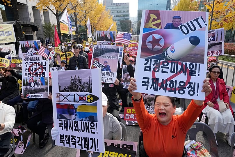Demonstrators stage a rally against a recent alleged deployment of North Korean troops to Russia near the Seoul Central District Court in Seoul, 15 November, 2024