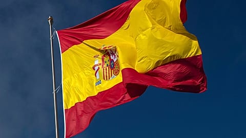 FILE. The Spanish flag flies in Madrid, Oct. 2020