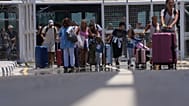 Evacuees from Israel arrive at the airport of Larnaca, Cyprus, Tuesday, June 24, 2025