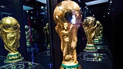 The FIFA World Cup trophy is reflected in different mirrors during an exhibition in Buenos Aires, 20 February, 2026