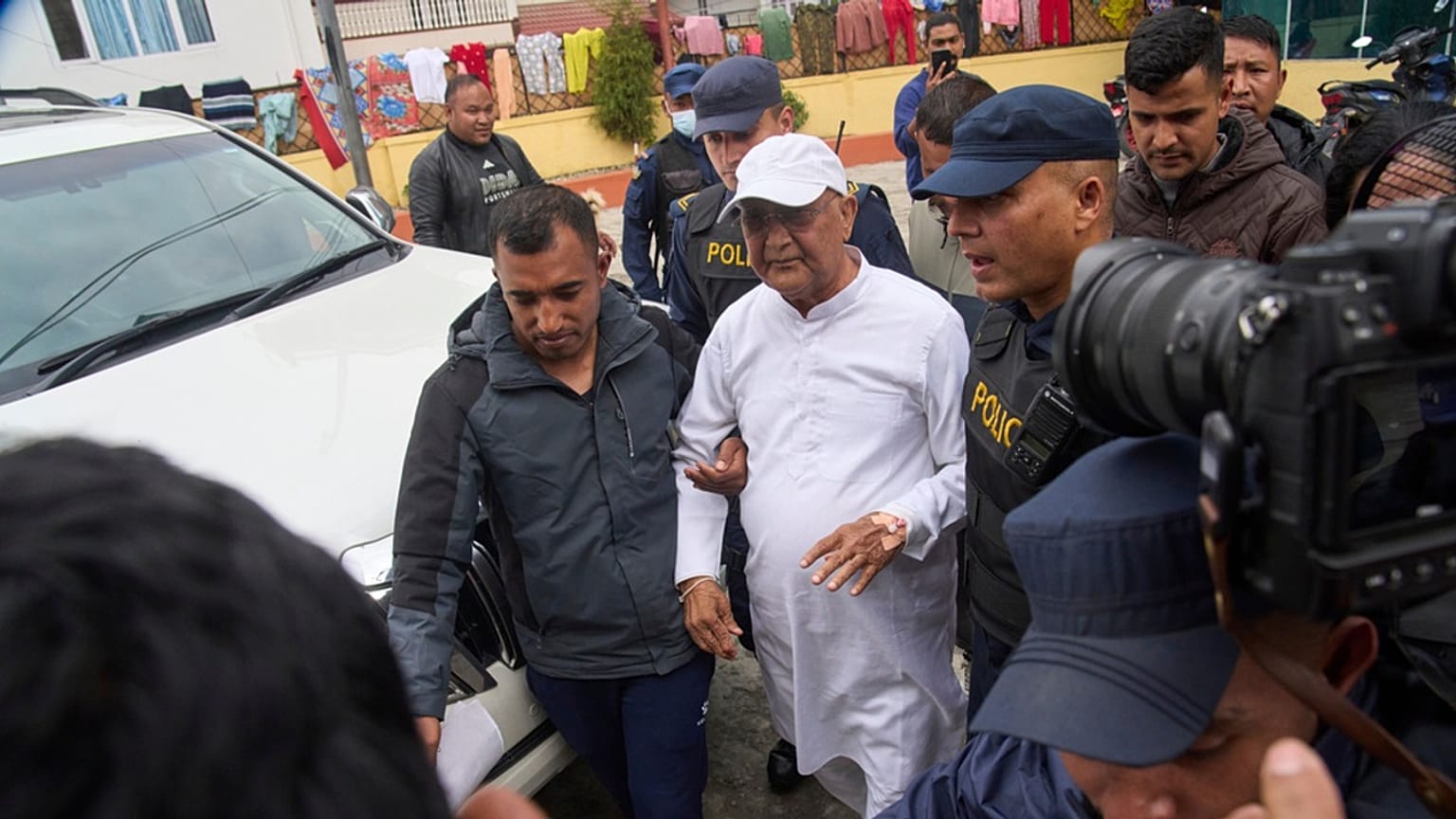 Former Prime Minister Khadga Prasad Oli is taken for procedural medical checkup after he was arrested by police in Kathmandu, Nepal, Saturday, March 28, 2026
