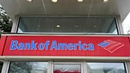 PHOTO D'ARCHIVES - Un distributeur automatique de billets de la Bank of America est visible, le mercredi 3 février 2021, à Winchester, dans le Massachusetts.