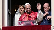 Pope Leo XIV, Princess Charlene and Prince Albert II of Monaco appear at the Gallery of Hercules balcony at the Prince's Palace, Monaco, Saturday, March 28, 2026