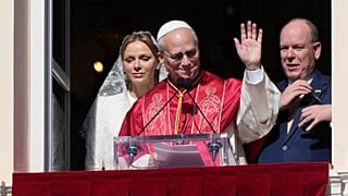 Pope Leo XIV, Princess Charlene and Prince Albert II of Monaco appear at the Gallery of Hercules balcony at the Prince's Palace, Monaco, Saturday, March 28, 2026
