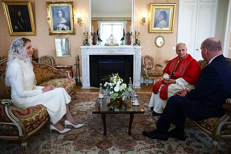Princess Charlene and Prince Albert II of Monaco meet Pope Leo XIV at the Prince's Palace during the pope's one-day visit to Monaco, Saturday, March 28, 2026
