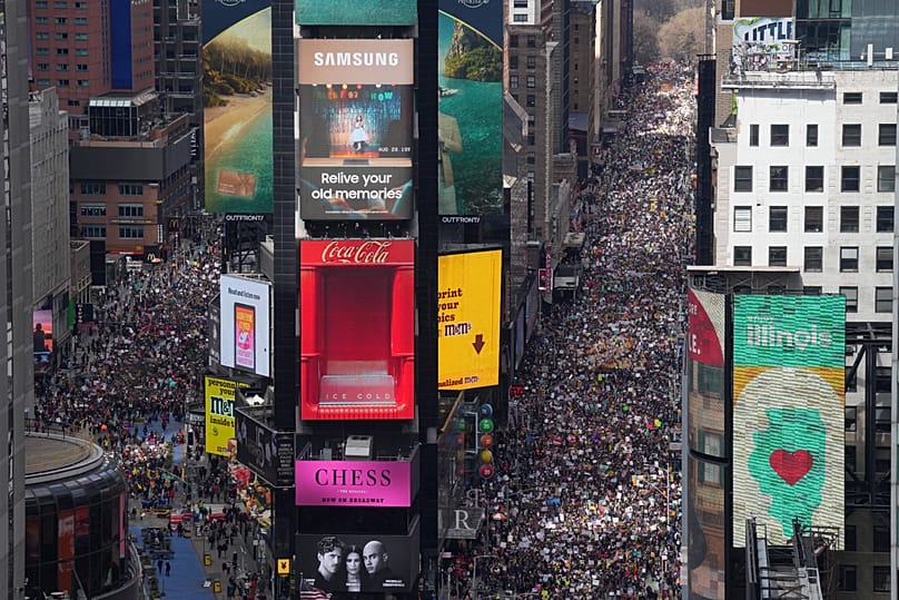 People attend a "No Kings" protest Saturday, 28 March, 2026, in New York.