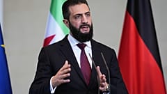 الرئيس السوري الانتقالي أحمد الشرع خلال مؤتمر صحفي في برلين، ألمانيا، 30 مارس/آذار 2026.