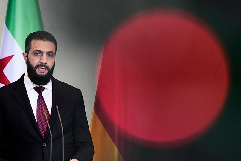 Syrian President Ahmad al-Sharaa attends a press conference after meeting with German Chancellor Friedrich Merz in Berlin, 30 March, 2026