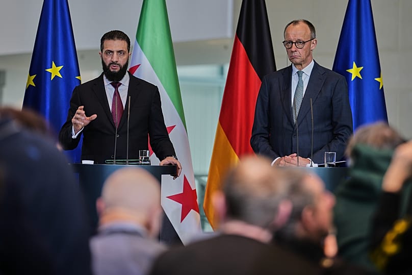 German Chancellor Friedrich Merz and President of the Syrian transitional government Ahmed al-Sharaa give a press conference in Berlin, 30 March, 2026