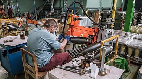 A worker at VMZ Sopot preparing the forged steel artillery shell bodies in the mechanical workshop, 17 October, 2025