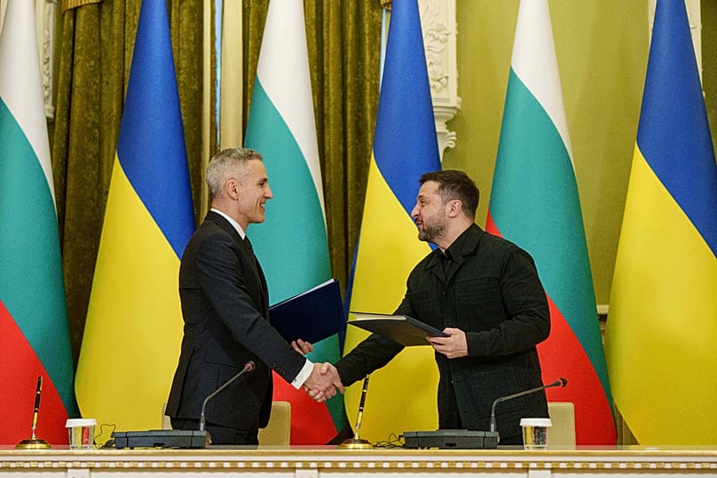 Bulgaria's Prime Minister Andrey Gyurov and Ukraine's President Volodymyr Zelenskyy shake hands after signing cooperation documents in Kyiv, 30 March, 2026