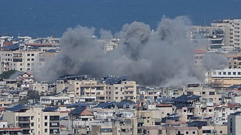 Smoke rises following an Israeli airstrike in Dahiyeh, Beirut's southern suburbs, Lebanon, Monday, March 30, 2026