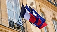 FILE - French and European flags float at the presidential Elysée palace during the weekly cabinet meeting, 20 April 2022 in Paris