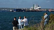 Journalists do a standup in front of the Russian-flagged oil tanker Anatoly Kolodkin docked in Matanzas, 31 March, 2026