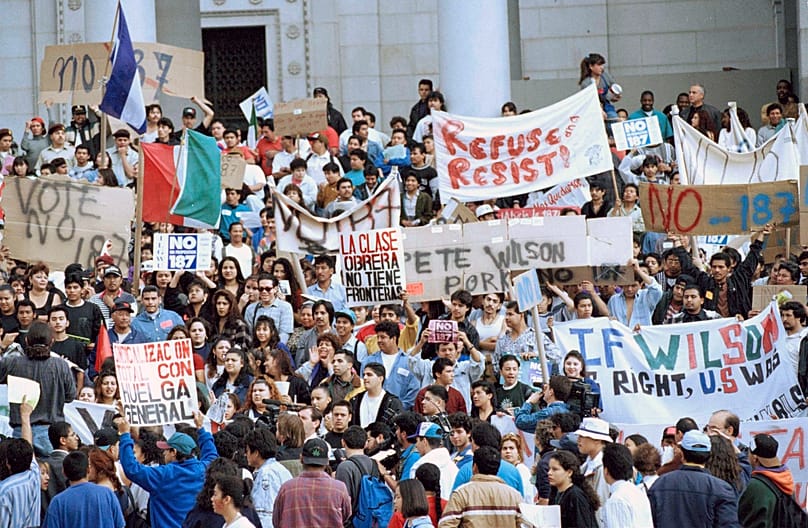 Protesters at Los Angeles City Hall, Nov. 7, 1994, demonstrating against Proposition 187. (AP Photo/Nick Ut)