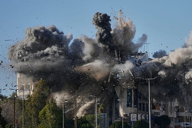 Smoke rises after an Israeli airstrike hits a building near the airport road in Beirut, Lebanon, Tuesday, March 31, 2026. 