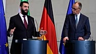 Der deutsche Bundeskanzler Friedrich Merz (links) empfängt Ahmed al-Sharaa, den Präsidenten der syrischen Übergangsregierung