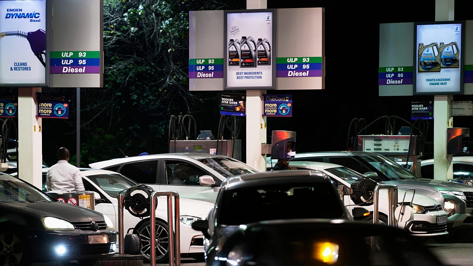 People queue to buy fuel at a petrol station, in Johannesburg, South Africa, Tuesday, March 31, 2026