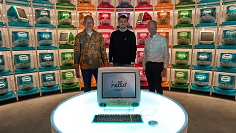 Museum founders Ed Bindels, Luuk de Rijk and Antonie de Kok, from left, pose at new the Apple Museum in the Netherlands