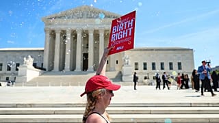 Demonstrators rally outside the US Supreme Court in Washington, 1 April, 2026