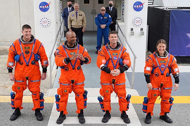 Astronauts Jeremy Hansen, Victor Glover, Reid Wiseman and Christina Koch on their way for liftoff on NASA's Artemis II moon rocket at the Kennedy Space Center, April 1, 2026.
