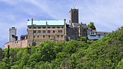 Wartburg Castle is a castle in Thuringia, situated above the town of Eisenach at the north-western end of the Thuringian Forest.