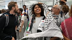 Rima Hassan arrives at Orly airport after being deported from Israel for taking part in a Gaza-bound aid flotilla, 7 October, 2025 