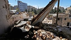 A residential building damaged by recent US-Israeli strikes in Fardis, 3 April, 2026