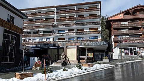 Flowers at the entrance of the "Le Constellation" bar where a fire which broke out during New Year's celebrations in Crans-Montana, 26 January, 2026