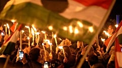 Supporters of Péter Magyar celebrate after a parliamentary election in Budapest, 12 April, 2026