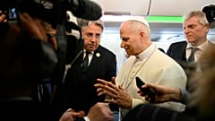 Pope Leo XIV speaks to journalists aboard his flight bound for Algiers’ Houari Boumédiène International Airport on Monday