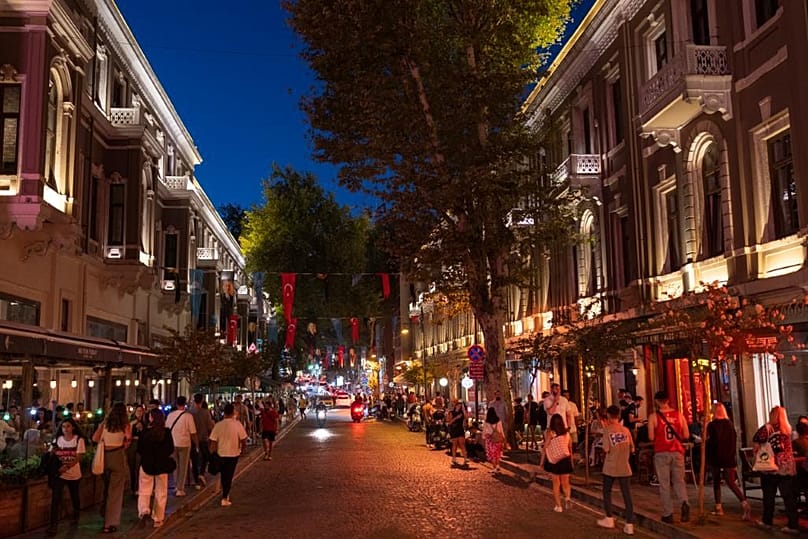 The city is always busy, event at night.