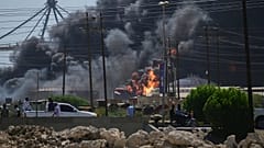FILE: Smoke billows after drone strikes by the paramilitary Rapid Support Forces (RSF) targeted the northern port in the Red Sea city of Port Sudan, 6 May 2025