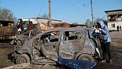 Поврежденные автомобили в Запорожской области Украины, 15 апреля