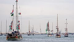 Boats carrying activists and humanitarian aid for Palestinians in Gaza reposition in the port during a symbolic send-off as part of the Global Sumud Flotilla in Barcelona, 12 