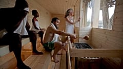 FILE: Models pose for photographers to launch the new Finnish Rooftop Sauna on the Queen Elizabeth Hall roof at the Southbank Centre in London, 9 November 2017