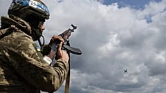A Ukrainian serviceman shoots towards a drone during training in the Zaporizhzhia region, 8 April, 2026