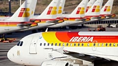 In this Nov. 12, 2009 file photo, Iberia planes are seen parked-up at Barajas airport in Madrid. 