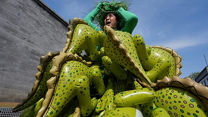 Chinese Artist Kong Ning Celebrates World Earth Day in Beijing with Peace-Themed Wearable Art Installation Highlighting Environmental Concerns - News Directory 3