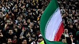 I tifosi iraniani festeggiano dopo che la loro squadra si è qualificata per la Coppa del Mondo di calcio 2026 vincendo una partita di calcio tra Iran e Uzbekistan a Teheran, 25 marzo 2025.