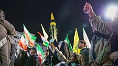 FILE: A ballistic missile is displayed by Iran's Revolutionary Guard during a pro-government demonstration at Enqelab-e-Eslami Square in downtown Tehran, 21 April 2026