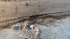 Uomo con mortaio a Pompei