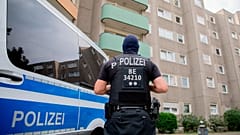 German police officers secure the streets during the delivery of three alleged Russian spies to a court in Frankfurt, 9 December, 2025