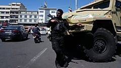 FILE: A member of Iran's police special forces stands guard in Tehran, 24 April 2026